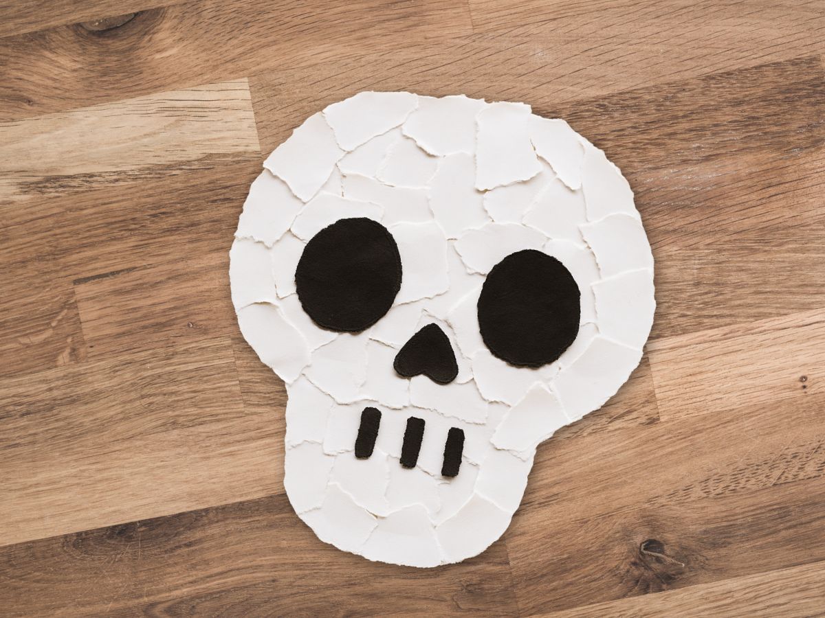 Ripped paper skull craft.
